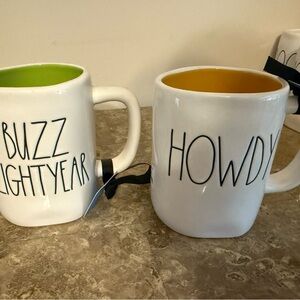 Rae Dunn Buzz Lightyear and Howdy Mugs - White with Green and Orange Interior